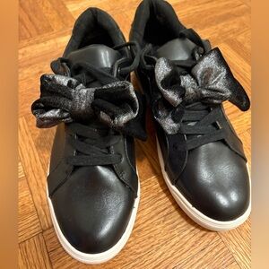 NWT SAKS FIFTH AVENUE sneakers
Black leather with bows
Brand new without box